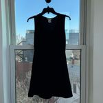 Planet Gold ⟡ black sleeveless wrap-style mini dress in size M ⟡ Photo 4