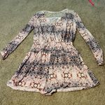 BCBGeneration Light pink and purple patterned long sleeve romper with lace back never worn  Photo 0