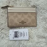Coach wallet tan and white Photo 1