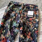 Anthropologie Mid Rise Skinny Jeans with floral print Photo 11