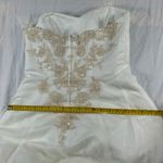 David's Bridal . Style T8818 size 10 wedding dress. 
Worn once. Was cleaned. Photo 8