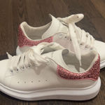 Alexander McQueen Women's Oversized Sneaker in white pink glitter Photo 1