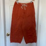 We The Free  Yuki Barrel Orange Jeans Size L Photo 1