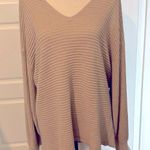 1. State  cream and gold specs thru the sweater Photo 0