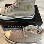 Converse  High-Top Sneakers in Light Tan with Gold Logo Photo 1
