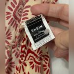 SheIn Red and Cream Patter jumpsuit Photo 1