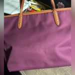 Coach Sawyer tote bag in a plum with leather accents and gold hardware Photo 3