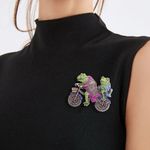 Brooch pin of two frogs riding a motorcycle adorned with sparkly crystals Gold Photo 0
