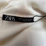 ZARA Scarf Collar Long Sleeve Blouse in a Cream Color The Cuffs have 3 Button Photo 3