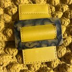 Yellow Textured Handbag with Strap and buckle Photo 1