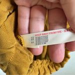 Free People Movement Heart Center Mustard Romper Size Xsmall Gold Photo 8