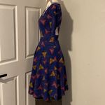 LuLaRoe  Nicole women’s purple atomic triangle ,stretch knit dress size S Photo 4