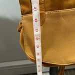 See By Chloe Chloe EUC Tan Crossbody Saddle Bag with Decorative Closure and Tassel Photo 4