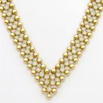 Gold Tone beaded V Photo 2