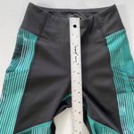 ASICS  D1 Leggings Womens XS Athletic Side Pockets Black Green Stripes Activewear Photo 7