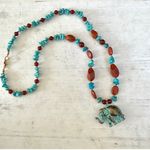 Brass elephant pendant necklace with carnelian, turquoise and red jasper beads Photo 1