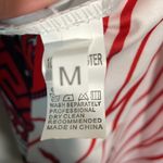 Jumpsuit fun and funky red patterned jumpsuit Size M Photo 3