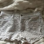 Hollister  White Jean Shorts with Intricate Lace Hem Photo 0
