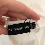 Pretty Little Thing NEW NWT Woven Cross Front Cutout Stirrup Hem Top Cream Ivory 8 Photo 5