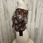 J for Justify  Brown top off the shoulders Photo 3