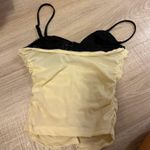 Amazon going out top Yellow Photo 1