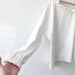Tibi  Off the Shoulder Ruffle Long Sleeve Top in White Photo 2