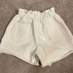 Princess Polly white high waisted denim shorts with the elastic waistband Photo 1