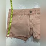 American Eagle Outfitters women’s light pink stretch raw hem Jean Shorts size 6 Photo 7
