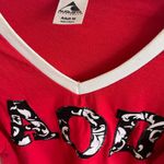 Augusta Sportswear Alpha Omicron Pi V Neck Floral Letters Tee Photo 1