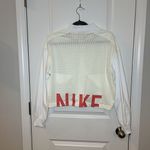 Nike  Women’s Windbreaker Jacket Large Mesh Cropped Photo 1