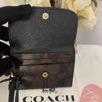 Coach  Black and Brown Wristlet with Gold Accents Photo 2