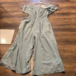 Patrons of Peace  Blue Jumpsuit Photo 1