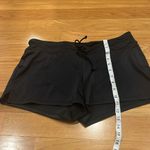 Tropical Escape  women’s black swim shorts size 10. Photo 6