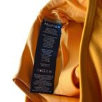 Peloton Women’s M Cadet Rib High Neck Cutout Sports Bra Bright Orange Athletic Photo 8