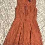 Trixxi Trick Dress Coral with Front tie and zip back Photo 0