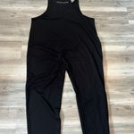 Black Jumper Size Small pit to pit is 19, length is 49, straps do not adjust Photo 0