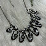 Odd oval faceted rhinestones statement silver tone necklace Photo 1