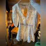 Selfie Leslie  Gorgeous Plunging Neck and Back Lace Detail Dress Photo 1