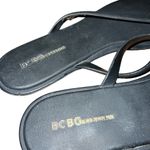 BCBGeneration BCBGGeneration black flip flops with gold detail women’s size 9 Photo 4