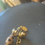 Joan Rivers  gorgeous animal print necklace. The beads are wooden.​ Photo 3