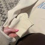 Brandy Melville John Galt “New York” Yellow Crewneck Photo 3