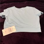 Halara 028HA.- SoftlyZero™ Plush Crossover Hem Cropped Sports Top. Photo 1