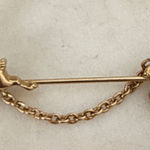Vintage 1983 Avon Gold Reindeer and Sleigh Brooch Photo 0