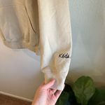 Keith Haring Graphic Multi Colored Print Hooded Pullover Sweatshirt Size Medium Tan Photo 2