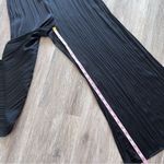 Free People black silky Larina jumpsuit pleated wide leg women’s size 2 Photo 4