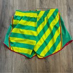 Nike  Dri-Fit Athletic Shorts Women's size Small in Green Yellow stripes running Photo 1