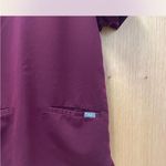 FIGS Women's Casma Three-Pocket Scrub Top in Deep Burgundy.β XS-P Photo 3