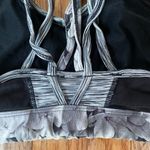gray and black marbled athletic sports bra Photo 6