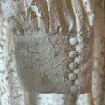 H&M NWT  Lace Blouse with button wrist detail and mock neck size Large Photo 3