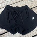 ASICS running split shorts women’s size small Photo 0